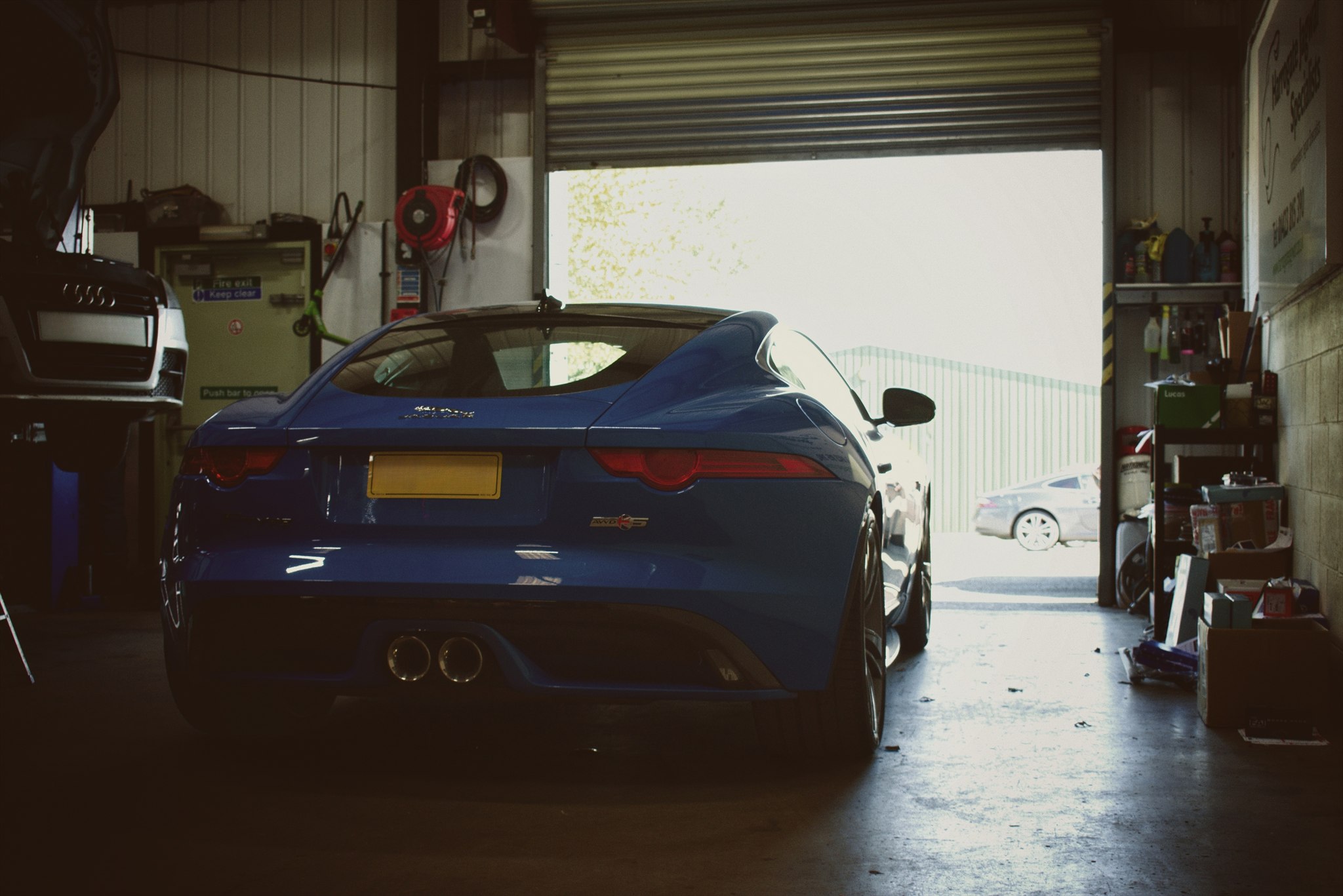 Jaguar F-Pace rear view outside workshop bays