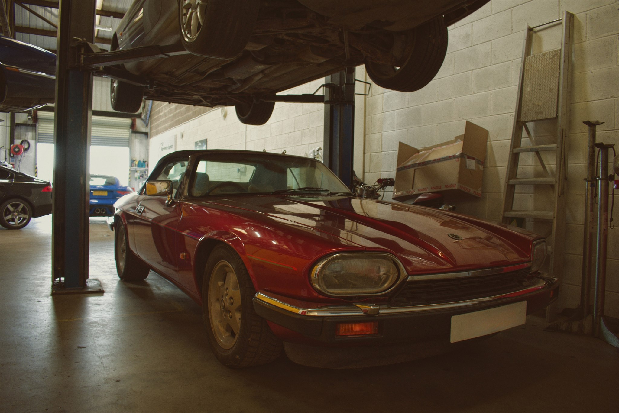 Front fascia and quad headlights of classic Jaguar